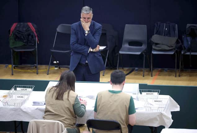 DUP South Antrim MP Paul Girvan looks on as the votes are counted during today's Antrim and Newtownabbey Borough Council election count at the Valley Leisure Centre in Newtownabbey