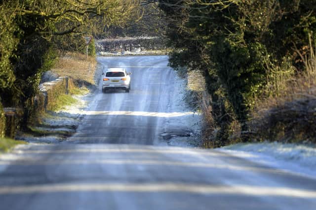 Motorists drive on wintry conditions in Crumlin Co Antrim 
Pic Colm Lenaghan/Pacemaker