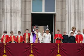 King Charles III and Queen Camilla on the balcony of Buckingham Palace, London, following the coronation. Picture date: Saturday May 6, 2023. PA Photo