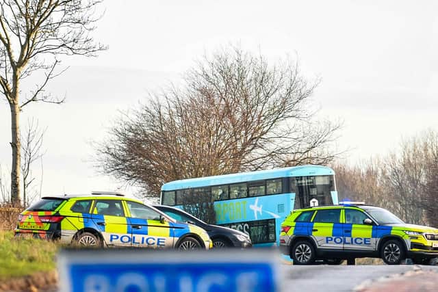 Police at the scene of the fatal crash on Ballyrobin Road, Templepatrick. Photo: Andrew McCarroll/ Pacemaker Press
