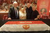 Former Man Utd goalie Alex Stepney, supporter Susan Atkinson (wife of Eamon), Belfast-born former Man Utd midfielder (and Northern Ireland manager) Sammy McIlroy, and Eamon Atkinson, all pictured at the International Suite at Old Trafford