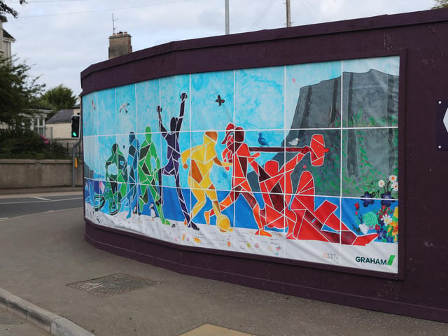 Colourful artwork created by pupils from Cross and Passion College and Ballycastle High School, now displayed on the hoarding surrounding the new Ballycastle Leisure Centre