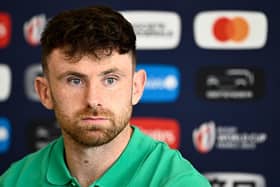 Ireland's full-back Hugo Keenan reacts as he addresses a press conference at Fauvettes Stadium, in Domont, north of Paris. (Photo by JULIEN DE ROSA/AFP via Getty Images)