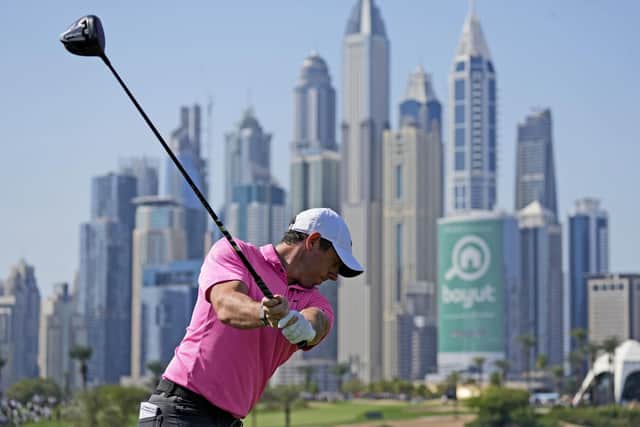 Northern Ireland’s Rory McIlroy  tees off on the 8th hole during the third round of the Hero Dubai Desert Classic.
