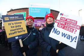 Nurses Sarah Donnelly (left) and Nicola Joyce on the picket line outside the Royal Victoria Hospital in Belfast, as nurses in England, Wales and Northern Ireland take industrial action over pay. Picture date: Tuesday December 20, 2022.