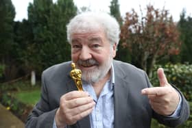 James Martin's father Ivan Martin at their family home in south Belfast with a miniature Oscar statuette after An Irish Goodbye won the Oscar for best live action short film at this year's Academy Awards