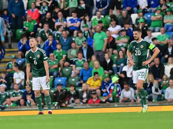 George Saville and Craig Cathcart dejected during defeat to Kazakhstan in Belfast