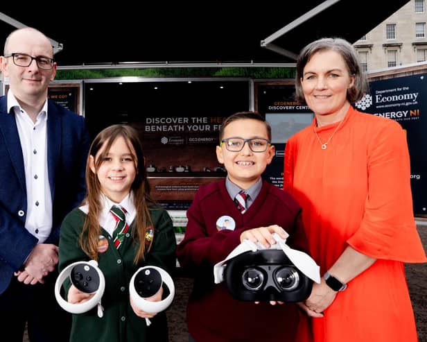 A new mobile GeoEnergy Discovery Centre has been launched to help inform the public about the potential for geothermal energy in Northern Ireland as a renewable and sustainable energy source.. Millie from Dundonald Primary School and Jayden from Holy Trinity Primary School in Belfast are pictured with Ryan White, director of heat, buildings and climate change at DfE and Marie Cowan, director of GSNI at the launch of the interactive GeoEnergy Discovery Centre