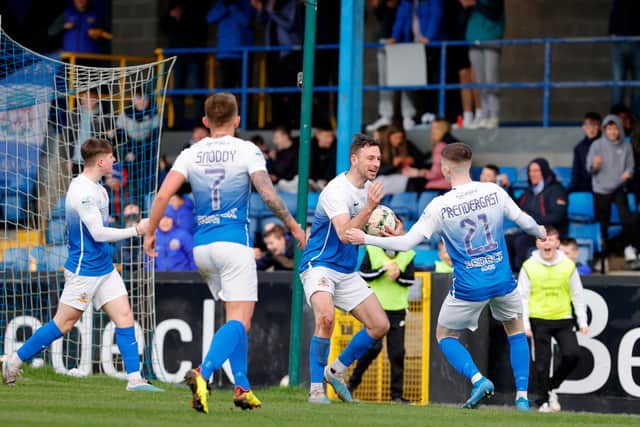 Glenavon's Matthew Fitzpatrick celebrates with his team-mates after his goal during Saturday's win against Glenavon.