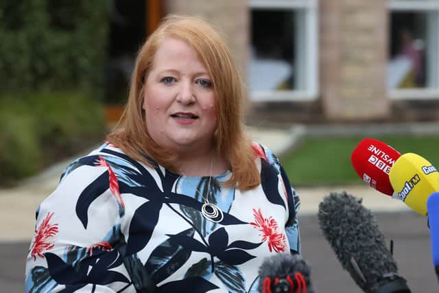 Alliance Party leader Naomi Long. Her party says it is running in 78 District Electoral Areas out of 80, which it says is more  than any other party in this election.