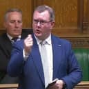 An animated Jeffrey Donaldson addresses MPs in the House of Commons. In the course of his speech he told MPs he had been threatened by loyalists over rumours that a deal is being cooked up with the government which would see the DUP return to Stormont without the total removal of the Irish Sea border.
