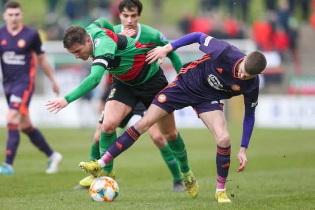 Ryan Carmichael in action for Portadown against Glentoran's Marcus Kane in the 2019/20 Irish Cup fifth round. PIC: Matt Mackey / Press Eye.