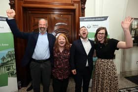 Alliance Party candidates David Bell, party leader Naomi Long, Peter McReynolds and Fiona McAteer celebrate winning seats at Belfast City Hall during the Northern Ireland council elections Picture date: Saturday May 20, 2023.