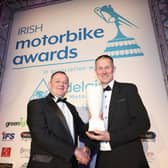 Barry Davidson receives the Classic Bike Festival Services to Motorcycling award from Phillip McCallen at the Adelaide Irish Motorbike Awards in Belfast
