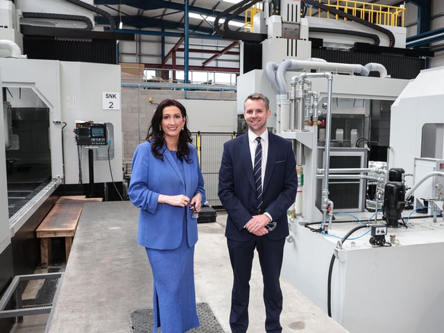 Joel Best, operations director at SAM NI with Emma Little- Pengelly dFM inside their new £10m facility