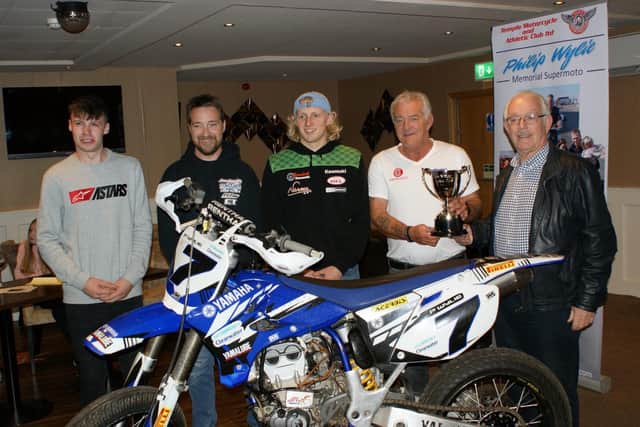 Richard Kerr, Justin Reid, Scott Swann and John Hoy with the Philip Wylie Memorial Cup. Also pictured is David Gibson (Temple Motorcycle Club Chairman) at the launch of the 2022 Philip Wylie Memorial Supermoto event.