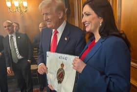 Deputy First Minister Emma Little Pengelly presenting US President Donald Trump with a personalized flag from Royal Portrush Golf Club, at the US Capitol in Washington DC. Photo: NI Executive /PA Wire
