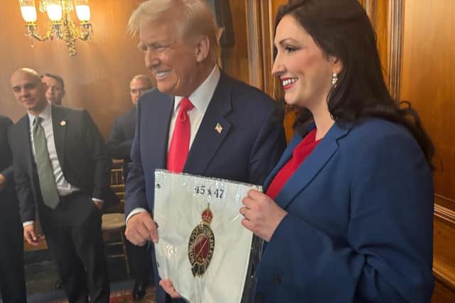 Deputy First Minister Emma Little Pengelly presenting US President Donald Trump with a personalized flag from Royal Portrush Golf Club, at the US Capitol in Washington DC. Photo: NI Executive /PA Wire