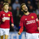 Manchester United's Bruno Fernandes celebrates scoring from a penalty during the Emirates FA Cup against Wigan Athletic. (Photo by Nick Potts/PA Wire)