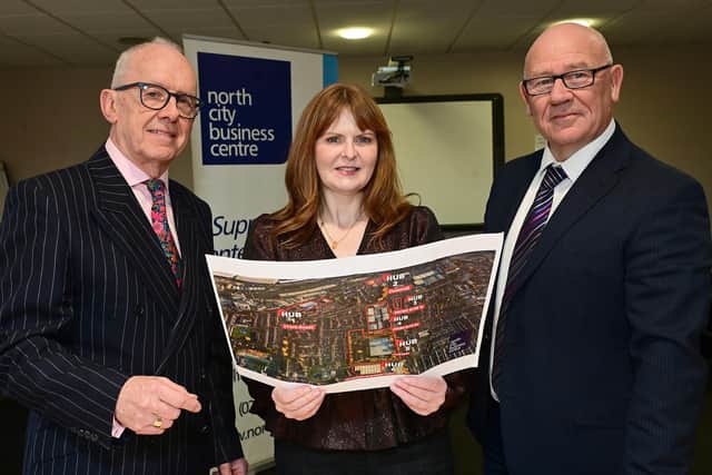 £3.75m investment will see three buildings in north Belfast transformed to provide community-based facilities. Pictured is Economy Minister Dr Caoimhe Archibald at the North City Business Centre with David Williamson, chair of NCBC and its chief executive Bill Atkinson