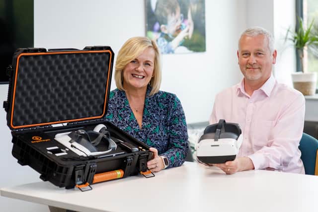 Belfast mum Sara McCracken, from social enterprise Empatheyes, demonstrates the new VR visual impairment simulator to Stephen Ellis, innovation manager at Innovation Factory. This new system, developed in Belfast, will be showcased in the United States at Vision 2023, a major international conference on Low Vision Rehabilitation. The aim of the system is to let those supporting adults and children with a vision impairment understand the impact of living with their specific eye condition to help carers better support and advocate for them