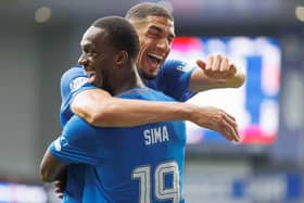 Rangers centre-back Leon Balogun with striker Adballah Sima