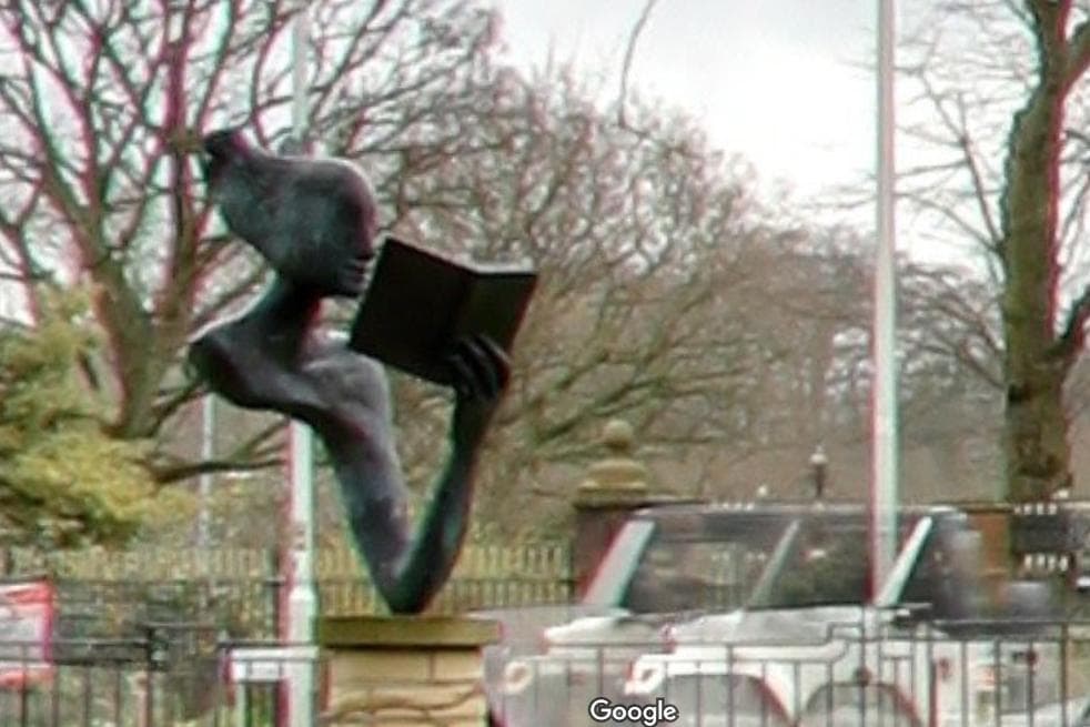 Statue of girl and blackbird reading a book stolen from outside Belfast library