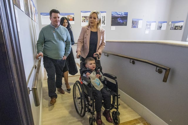 Six-year-old Daithi Mac Gabhann and his parents Mairtin Mac Gabhann (left) and mother Seph Ni Mheallain (centre) meet Sinn Fein Vice President Michelle O'Neill  (right) as they arrive at Parliament Buildings at Stormont, ahead of a recalled sitting of the Assembly focused on a stalled organ donation law