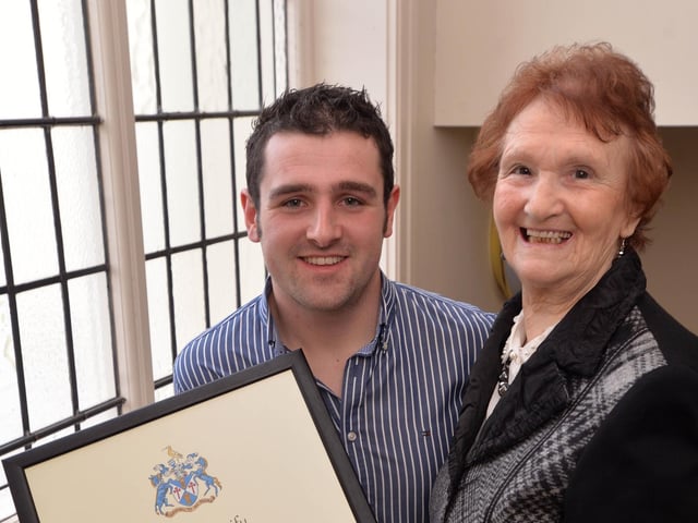PACEMAKER, BELFAST, 17/1/2014: That's my boy!
Michael Dunlop is congratulated on receiving the Freeman of the Borough of Ballymoney by his grand mother May.
The 24 year old, who received the award after winning four Isle of Man TT races in 2013, followed in the footsteps of his famous Uncle Joey and his late father Robert, who became Freemen of the Borough in 1993 and 2007 respectively.
PICTURE BY STEPHEN DAVISON:-