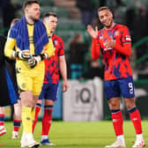 Rangers' Cyriel Dessers (centre) applauds the fans following the cinch Premiership victory over Hibernian at Easter Road as the Ibrox side closed the gap to Celtic to five points