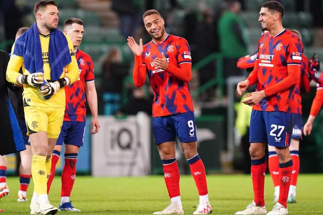Rangers' Cyriel Dessers (centre) applauds the fans following the cinch Premiership victory over Hibernian at Easter Road as the Ibrox side closed the gap to Celtic to five points