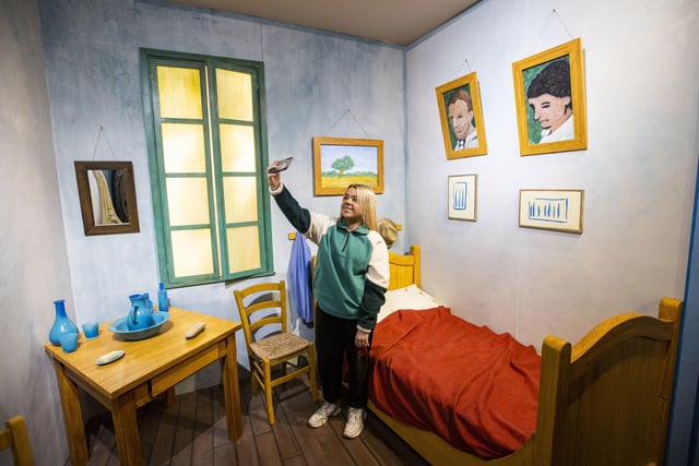 Evvie Bishop looks at Van Gogh's Bedroom at Van Gogh: The Immersive Experience exhibition at Carlisle Memorial Church in Belfast
