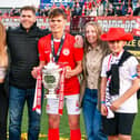 James Simpson celebrates lifting the Gibson Cup with his family. (Photo by Andrew McCarroll/Pacemaker Press)