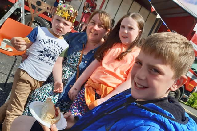 Julie McMurray enjoying the Dromore Carnival with her children Micah (left), Ella and Noah.