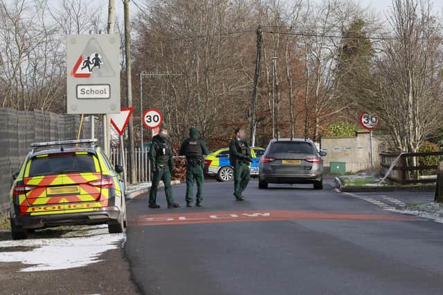 PSNI officers at the scene of a suspicious object on the Gortgonis Road in Coalisland