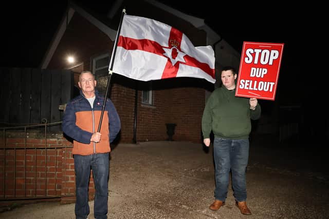 TUV members Mark McKendry (left) and Mark Gracey outside Moygashel Orange Hall during a public meeting on Thursday February 1, 2024. PA Photo.