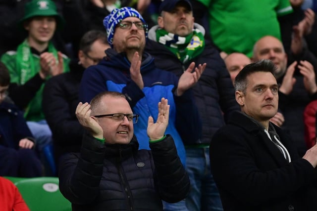 Northern Ireland fans get behind their team at the National Stadium