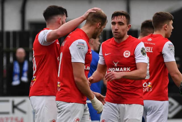Leroy Millar and Paul O'Neill of Larne celebrate the second goal during this afternoon’s game at Stangmore Park, Dungannon. PIC: Andrew McCarroll/ Pacemaker Press
