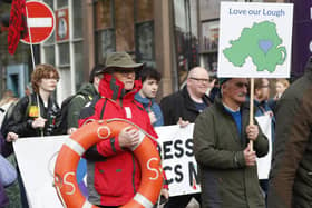 Save Lough Neagh protesters take part in a rally outside Belfast City Hall. Picture: Peter Morrison/PA Wire