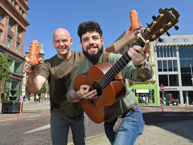 Gareth Hardy, Hardy Distribution, distributors of Boost Drinks in NI, is joined by musician, John Garrity to launch Boost Juic’d Blood Orange and Raspberry Crush’s search for Northern Ireland’s talented buskers, singers and musicians, some of whom will be chosen to perform on Boost’s Busker Corner stage