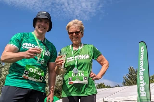 Bernie Burke (right), 61, with her son sean after completing a Macmillan Mighty Hike two months after a brain haemorrhage   Photo: Bernie Burke/PA Wire