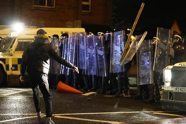 Objects are thrown towards PSNI officers with riot shields on the Springfield Road in Belfast during unrest in April 2021. With thousands of assaults on emergency workers recorded every year in Northern Ireland and the figures increasing, former health service nurse Bernadette Vassallo has started an online campaign for tougher sentences