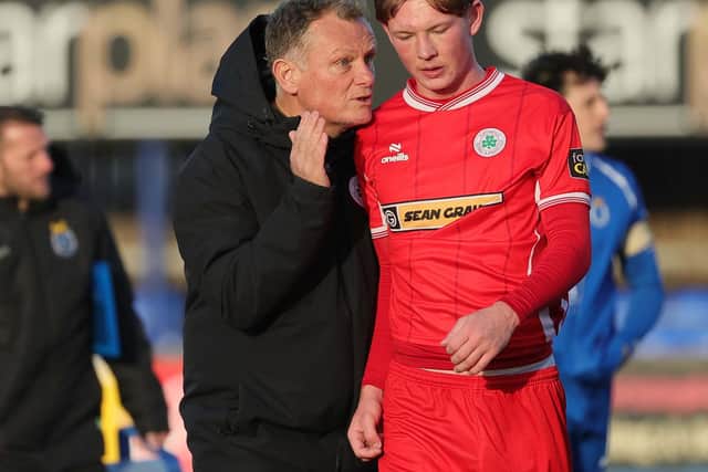 Cliftonville manager Jim Magilton (left) in conversation with two-goal Brian Healy last weekend in Dungannon. (Photo by David Maginnis/Pacemaker Press)