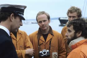 11 October 1982. The then HRH Prince Charles with salvage team divers (l to r) Kester Keighley, Martin Icke and Christopher Underwood.

Steve Foote, Mary Rose Trust photographer and diver:
"They were yelling and cheering and we felt like kings as we came in"