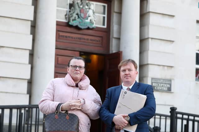 Eileen Wilson at the High Court in Belfast with her solicitor Ciaran O’Hare