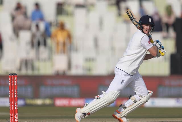 Harry Brook of England hits the ball towards the boundary during the First Test Match between Pakistan and England at Rawalpindi Cricket Stadium on Friday in Rawalpindi. (Photo by Matthew Lewis/Getty Images)