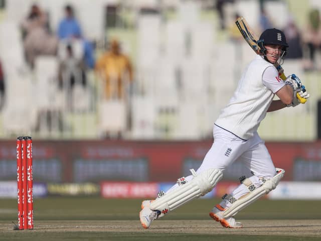 Harry Brook of England hits the ball towards the boundary during the First Test Match between Pakistan and England at Rawalpindi Cricket Stadium on Friday in Rawalpindi. (Photo by Matthew Lewis/Getty Images)