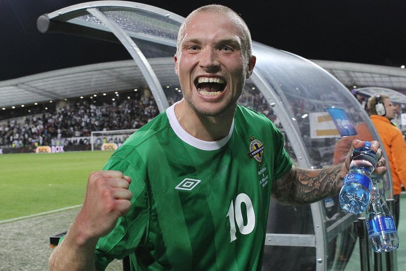 Current Glentoran boss Warren Feeney celebrates after playing his part in helping Northern Ireland defeat Slovenia
