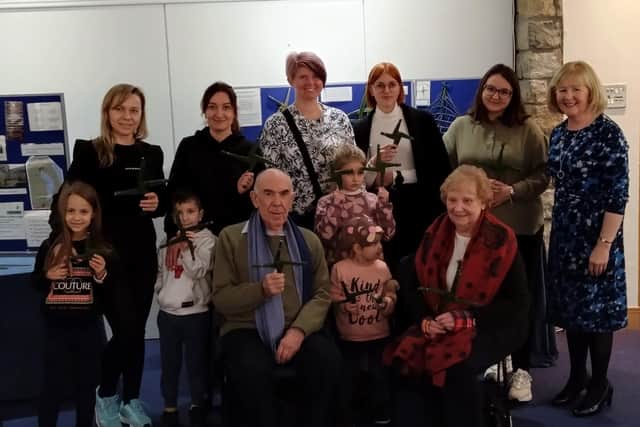 Oksana, Julia, Asya, Yuliia, Ivanna and their children pictured with local people Michael, Margaret Welch and experience presenter, Brigid Watson, Sustainable Journeys Ireland