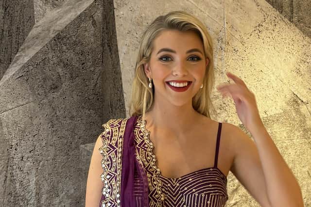 Miss NI Kaitlyn Clarke wearing a sari in India during the Miss World final